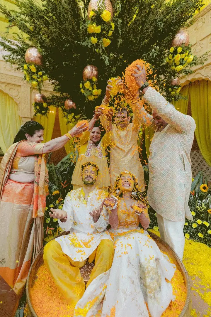 The couple showered with marigold petals